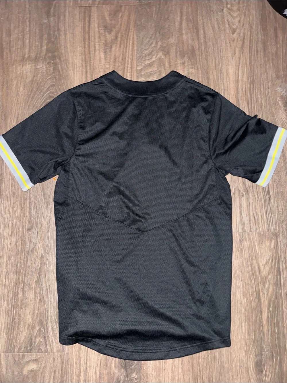 Nike Black Short-Sleeve Athletic Shirt with Yellow Duck Logo